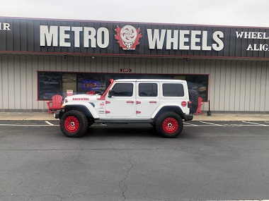 Black Rhino Wheels powder coated in firecracker red and installed on a white and red 2018 Jeep Sahara Wrangler in Marietta, GA at Metro Wheels & Accessories